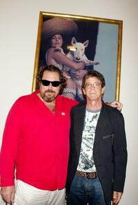 Julian Schnabel and Lou Reed at the annual Polaroid Benefit Auction for Free Arts.