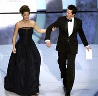 Keanu Reeves and Sandra Bullock at the 78th Academy Awards.
