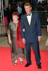 Regine and Guest at the opening gala of "The Matador" during the 31st Deauville Film Festival.
