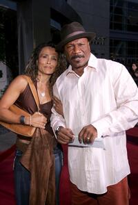 Ving Rhames and Guest at the premiere of "Hustle and Flow."