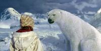 Dakota Blue Richards and Ian McKellen as the voice of Iorek Byrnison in "The Golden Compass."
