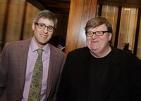 Mo Rocca and Michael Moore at the luncheon celebrating Moore's documentary "Sicko."