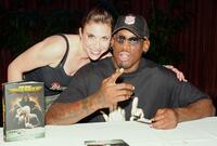 Wendy Aaron and Dennis Rodman at the signing of "I Should Be Dead By Now."
