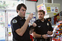 Two clueless cops, Officer Slater (Bill Hader) and Officer Michaels (Seth Rogen) in "Superbad."