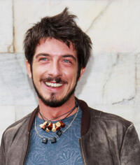 Paolo Ruffini at the Roberto Cavalli Spring/Summer 2013 fashion show as part of Milan Womenswear Fashion Week.
