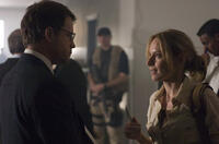 Defense intelligence agent Clark Poundstone (Greg Kinnear) is questioned by journalist Lawrie Dayne (Amy Ryan) in "Green Zone." 