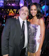 Jon Landau and Zoe Saldana at the after party of the California premiere of "Avatar."
