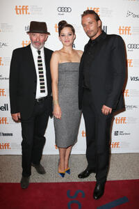 Writer/director Jacques Audiard, Marion Cotillard and Matthias Schoenaerts at the premiere of "Rust & Bone" during the 2012 Toronto International Film Festival.