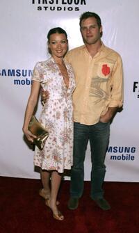 Natalie Zea and Travis Schuldt at the premiere of "Across The Hall."