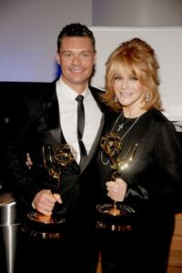 Ryan Seacrest and Ann-Margret at the 62nd Primetime Creative Arts Emmy Awards.
