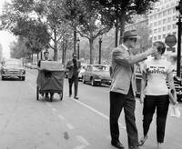 Jean Seberg, Jean-Luc Godard and Jean-Paul Belmondo at the time of the turning of film "A boils of breath".