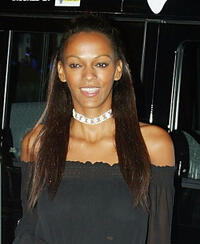 Judi Shekoni at the Hunter Hunted Exhibition in London.