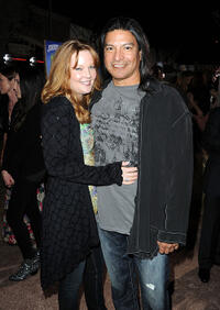 Gil Birmingham and Guest at the premiere of "Rango."