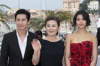 Shin Ha-kyun, Kim Hae-Sook and Kim Ok-Vin at the photocall of "Thirst" during the 62nd Cannes Film Festival.