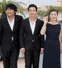 Song Kang-Ho, Shin Ha-kyun and Kim Hae-Sook at the photocall of "Thirst" during the 62nd Cannes Film Festival.