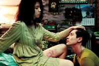 Kim Ok-vin as Tae-ju and Shin Ha-kyun as Kang-woo in "Thirst."