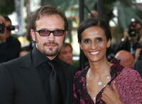 Vincent Perez and Karine Silla at the Ready-to-Wear A/W 2009 fashion show during the Paris Fashion Week.