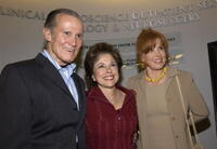 Henry Silva, Producer Kate Edelman Johnson and Stephanie Powers at the opening of the Deane F. Johnson Center For Neurotherapeutics.