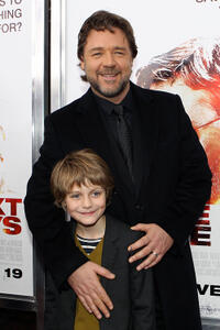 Ty Simpkins and Russell Crowe at the  New York premiere of "The Next Three Days."
