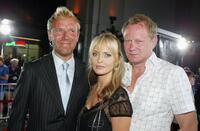 Director Renny Harlin, Izabella Scorupco and Stellan Skarsgard at the premiere of "Exorcist: The Beginning."