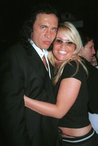 Gene Simmons and Guest at the Tongue Magazine Fall 2002 Issue release party.