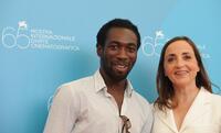 Cyril Guei and Dominique Blanc at the photocall of "L'Autre" during the 65th Venice International Film Festival.