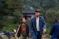 Jaden Smith as Dre Parker and Jackie Chan as Mr. Han in "The Karate Kid."