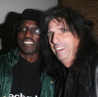 Wesley Snipes and Alice Cooper at the LA Confidential party.