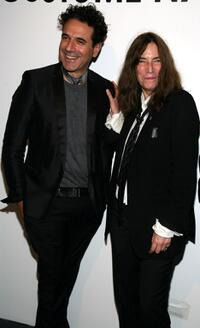 Ennio Capasa and Patti Smith at the Costume National Reception for "Patti Smith: Dream of Life."