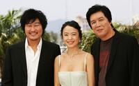 Song Kang-ho, Do-yeon Jeon and Chang-dong Lee at the photocall of "Secret Sunshine" during the 60th International Cannes Film Festival.