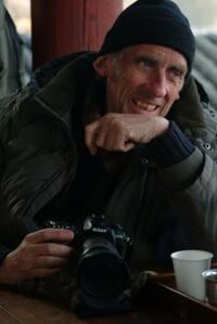 Director Roger Spottiswoode on the set of "The Children of Huang Shi."