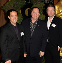 Director Lee Unkrich, producer John Lasseter and Andrew Stanton at the 83rd Academy Awards in California.