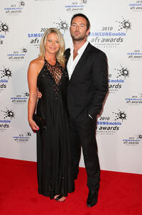 Jo Beth Taylor and Sullivan Stapleton at the 2010 Samsung Mobile AFI awards in Australia.