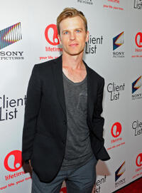 Trevor St. John at the red carpet launch party of "The Client List" in California.
