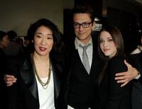 Sandra Oh, Peter Stebbings and Kat Dennings at the premiere of "Defendor."