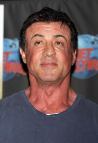Sylvester Stallone at the memorabilia from "Rambo" to Planet Hollywood in New York City.