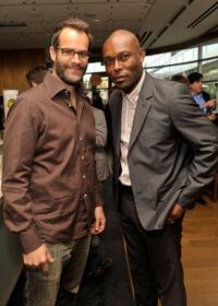 Josh Stamberg and Jimmy Jean-Louis at the FEED Foundation/Hungry In America project benefit hosted by Vanity Fair.