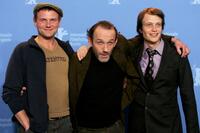 Devid Striesow, Karl Markovics and August Diehl at the photocall of "The Counterfeiters" during the 57th Berlin International Film Festival.