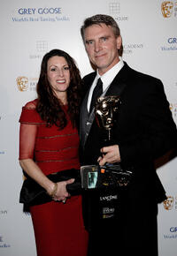 Robert Stromberg and Guest at the after party of BAFTA Soho House Grey Goose in England.