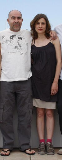 Christos Stergioglou and Aggeliki at the photocall of "Dogtooth" during the 62nd International Cannes Film Festival.