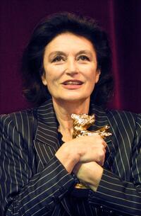 Anouk Aimee at the Berlinale Film Festival, clutches her Golden Bear Award for lifetime achievement.