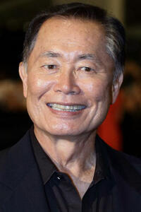 George Hosato Takei walks the red carpet during the Social Star Awards 2013 at Marina Bay Sands on May 23, 2013 in Singapore.