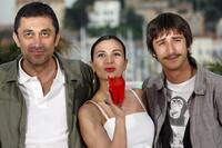 Director Nuri Bilge Ceylan, Hatice Aslan and Ahmet Rifat Sungar at the photocall of "Three Monkeys" during the 61st International Cannes Film Festival.