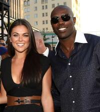 Serinda Swan and Terrell Owens at the premiere of "Hancock."