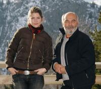 Alice Taglioni and Gerard Jugnot at the photocall of "L'ile aux tresors" during the 10th Comedian Film Festival.