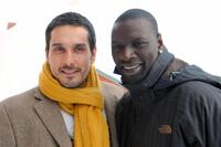Vincent Elbaz and Omar Sy at the presentation of "Tellement Proche" during the International Comedy Film Festival.