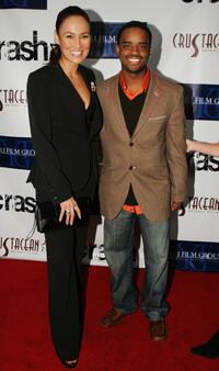 Larenz Tate and Tia Carrere at the "Crash" Academy Party.