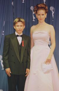 Jonathan Taylor Thomas and Molly Ringwold at the 1996 EMMY Awards.