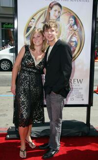 Max Thieriot and guest at the premiere of "Nancy Drew."