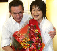 Director Patrice Leconte and Shinobu Terajima at the photocall of "L'homme du Train" in Tokyo.